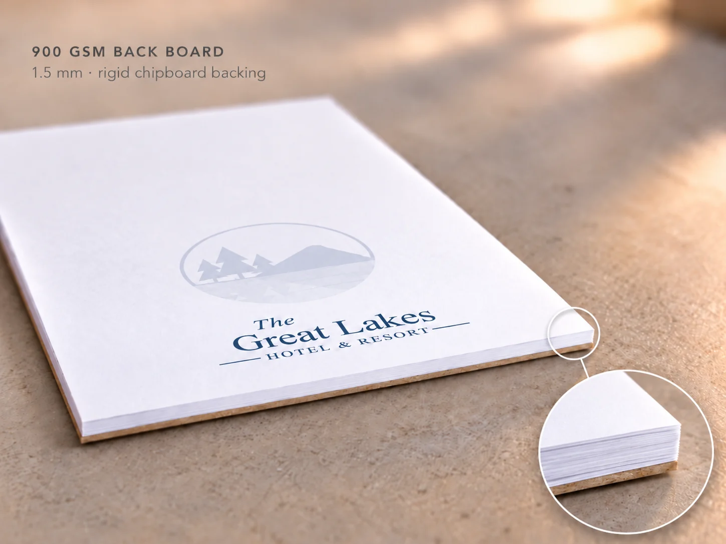 Hotel notepad on a 1.5 mm, 900 gsm rigid chipboard backing board, seen from the edge