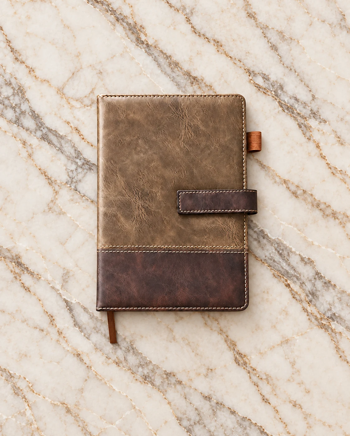 Branded executive notebook in brown leather-look with strap closure and pen loop